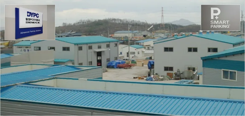 DYPC Gimpo factory: blue-roofed production halls under the DYPC and SMART PARKING signs